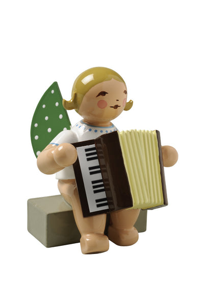 Angel Orchestra Musician Seated with Accordion