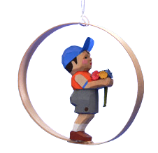 Boy with Flowers in Shaved-Wood Ring Ornament