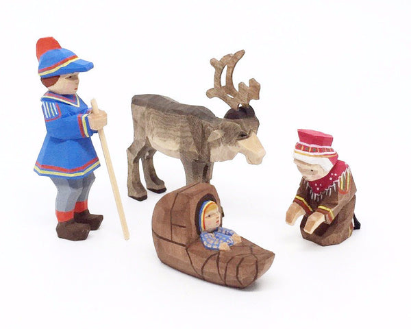 Lapp Couple with Child and Reindeer