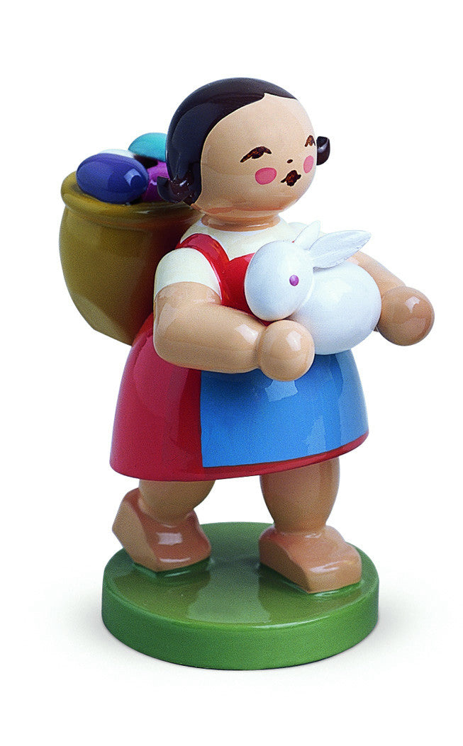 Girl with a Bunny and a Basket filled with Eggs